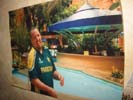 Max next to a pool in an exotic location (or possibly CenterParcs)